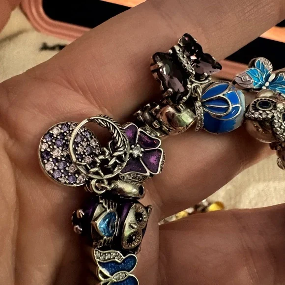 Linx bracelet with owl and butterfly charms